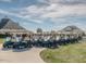 Several golf carts lined up for community access to the golf course, ready for a day on the greens at 601 Golfers Vw, Pittsboro, NC 27312