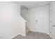 Bright entryway featuring hardwood floors and stairs leading to the second floor at 6048 Sodium St, Raleigh, NC 27610