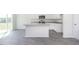 Modern kitchen with granite countertops, stainless steel appliances, and a center island at 6048 Sodium St, Raleigh, NC 27610