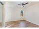 Cozy bedroom with natural light, wood flooring, and space for relaxation at 6800 Chamonix Pl, Raleigh, NC 27613