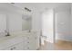 Well-lit bathroom with double vanity, modern fixtures, and a clean design at 7201 Spanglers Spring Way, Raleigh, NC 27610