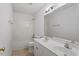 Bathroom featuring a double vanity, tub-shower combo, and neutral color scheme at 7201 Spanglers Spring Way, Raleigh, NC 27610