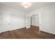 Bright office space with hardwood floors, closet, and french door entry at 9004 Penny Rd, Raleigh, NC 27606