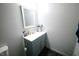 Compact bathroom featuring a modern vanity and clean design at 10125 Buffalo Rd, Clayton, NC 27527