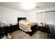 Comfortable bedroom featuring a large bed and closet at 10125 Buffalo Rd, Clayton, NC 27527