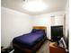 Comfortable bedroom featuring a large bed and ample natural light at 10125 Buffalo Rd, Clayton, NC 27527