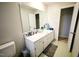 Bathroom featuring a vanity, a mirror, and tiled floors at 10166 Buffalo Rd, Clayton, NC 27527