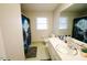 Bathroom featuring a vanity, a mirror, and a shower with a nature-themed curtain at 10166 Buffalo Rd, Clayton, NC 27527