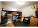 Bedroom with hardwood floors, lots of boxes, and minimal decor at 10166 Buffalo Rd, Clayton, NC 27527
