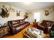 Inviting living room with hardwood floors, natural light, and unique decor at 10166 Buffalo Rd, Clayton, NC 27527