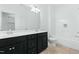 Bright bathroom featuring double vanity, modern fixtures, and shower-tub combination at 137 Fawnwood Acres Dr, Apex, NC 27539