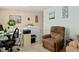 Comfortable office area with chair, printer, filing cabinet, and nice natural lighting at 138 Daneborg Rd, Durham, NC 27703