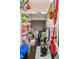 Walk-in pantry stocked with various food items and cleaning supplies at 138 Daneborg Rd, Durham, NC 27703