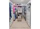 Well-organized walk-in closet with built-in shelving, drawers, and ample storage space at 138 Daneborg Rd, Durham, NC 27703