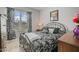Bedroom with neutral walls, a decorative bed, and window with natural light at 203 Mitchell Manor Dr, Angier, NC 27501