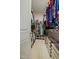 Walk-in closet with abundant storage, shelving, and organized clothing racks and storage bins at 203 Mitchell Manor Dr, Angier, NC 27501