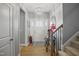 Inviting entryway featuring a chandelier, staircase, and decorative accents at 203 Mitchell Manor Dr, Angier, NC 27501