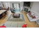 Open concept living room, dining room, and kitchen area with fireplace at 203 Mitchell Manor Dr, Angier, NC 27501