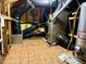 Attic featuring water heater and air ducts at 205 Cedar Elm Rd, Durham, NC 27713
