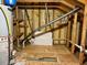 Attic with wooden beams and a water heater at 205 Cedar Elm Rd, Durham, NC 27713