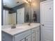 Bright bathroom with a double sink vanity, modern fixtures, and neutral paint at 205 Cedar Elm Rd, Durham, NC 27713