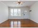 Inviting front room with hardwood floors, a front door, and bright windows at 205 Cedar Elm Rd, Durham, NC 27713