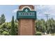 Brick entrance sign for Woodcroft community at 205 Cedar Elm Rd, Durham, NC 27713