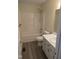 Bathroom with tub and shower combination and single sink vanity at 212 Davis Farm Dr, Selma, NC 27576