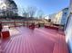 Outdoor deck featuring picnic table and backyard in the background at 212 Liberty Rose Dr, Morrisville, NC 27560