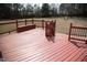 Outdoor deck featuring picnic table and backyard in the background at 212 Liberty Rose Dr, Morrisville, NC 27560