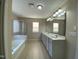 En-suite bathroom with double vanity, soaking tub, and separate shower at 212 Liberty Rose Dr, Morrisville, NC 27560