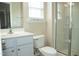 Bathroom featuring vanity, toilet, and glass enclosed shower at 212 Liberty Rose Dr, Morrisville, NC 27560