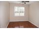 Neutral bedroom with hardwood floors and a ceiling fan at 212 Liberty Rose Dr, Morrisville, NC 27560