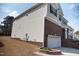 Exterior view of a well maintained two story home featuring brick and siding at 212 Liberty Rose Dr, Morrisville, NC 27560
