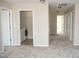 Hallway features carpet, doorways, washer and dryer nook, and recessed lighting at 212 Liberty Rose Dr, Morrisville, NC 27560