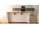 Kitchen with granite countertops, stainless steel appliances, backsplash and breakfast bar at 212 Liberty Rose Dr, Morrisville, NC 27560