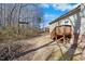 Backyard with a wood deck and stairs at 220 Courtland Dr, Angier, NC 27501