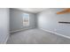 Neutral bedroom with carpet and a view at 220 Courtland Dr, Angier, NC 27501