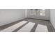Bright carpeted bedroom with natural light at 223 Frosted Iris Lane Ln # 176, Garner, NC 27529