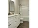 Bathroom featuring a vanity with a modern faucet and tub/shower combination at 2242 Eldridge Rd, Newton Grove, NC 28366