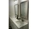 Bathroom with double vanity featuring modern sinks, faucets and large mirrors at 2242 Eldridge Rd, Newton Grove, NC 28366