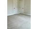Carpeted bedroom with two closets at 2242 Eldridge Rd, Newton Grove, NC 28366