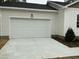 Front view of the garage, which is attached to the single story home at 2242 Eldridge Rd, Newton Grove, NC 28366