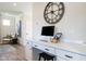 Brightly lit office nook with white cabinets, quartz countertops, and stylish decor at 275 Deodora Ln, Cameron, NC 28326
