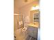Bathroom featuring a glass enclosed shower with white towels and a gray vanity at 311 Silverhawk Ln, Durham, NC 27703