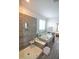 Modern primary bathroom features a glass-enclosed shower and a luxurious soaking tub at 311 Silverhawk Ln, Durham, NC 27703
