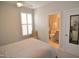Bedroom with a peek into the ensuite bath at 311 Silverhawk Ln, Durham, NC 27703