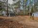Large backyard with mature trees at 314 Mill Creek Dr, Fuquay Varina, NC 27526