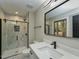 Modern bathroom with marble tile shower and quartz countertop vanity at 314 Mill Creek Dr, Fuquay Varina, NC 27526