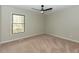 Neutral bedroom with a ceiling fan and plush carpet at 314 Mill Creek Dr, Fuquay Varina, NC 27526